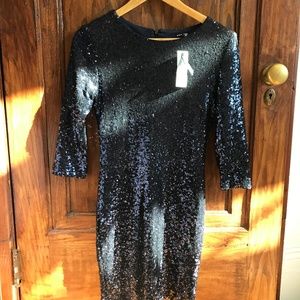 Size M sequinned TFNC London dress